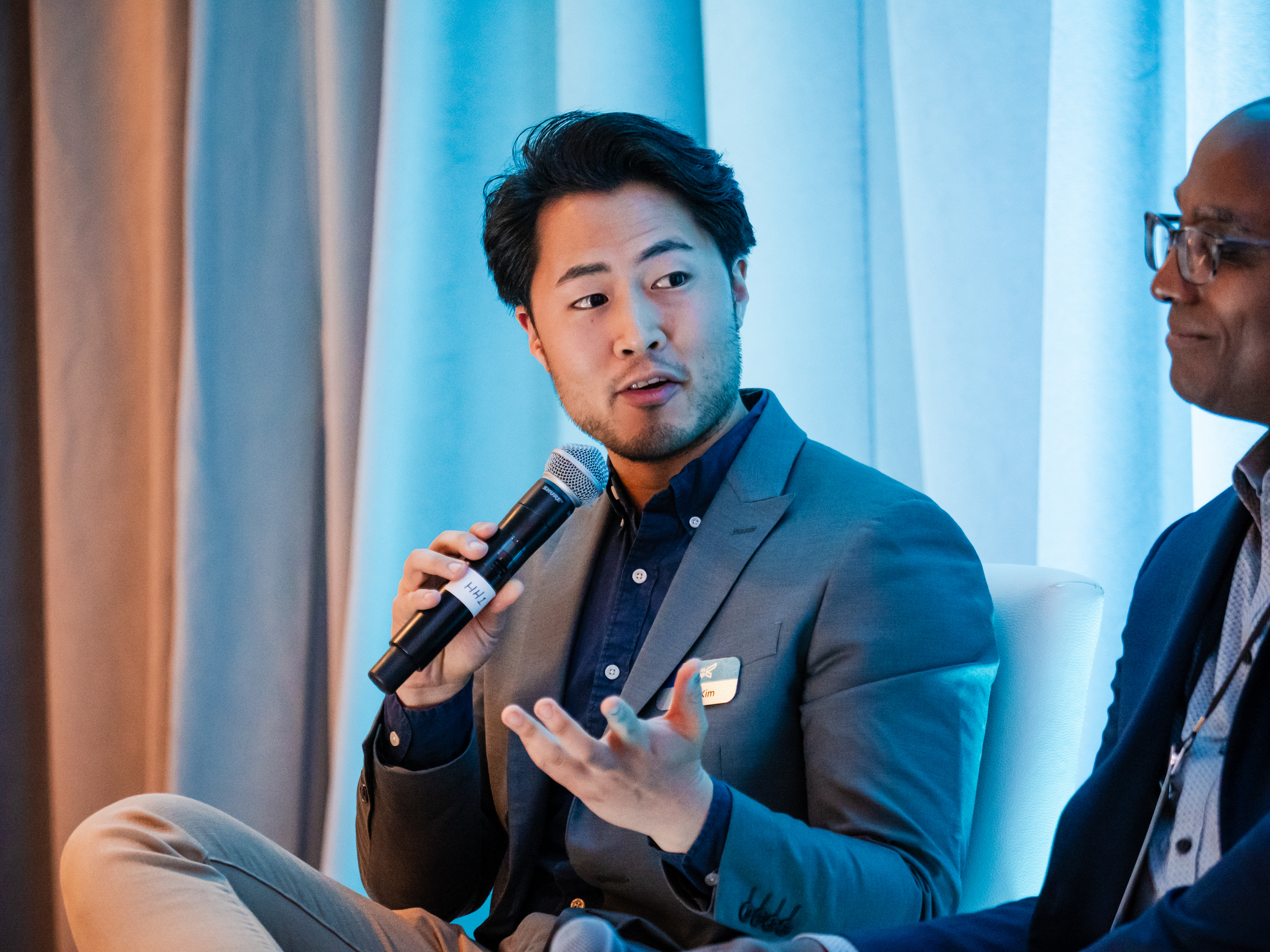Brian Kim speaking on a panel discussion